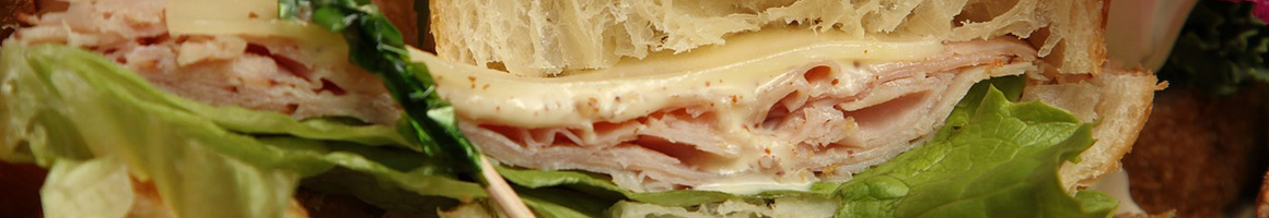 Eating Deli Sandwich at Giovanni's Delicatessen restaurant in Sea Isle City, NJ.